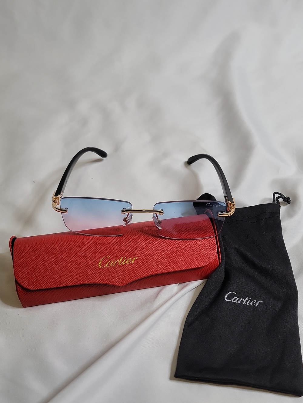 Cartier Rimless Gradient Sunglasses in Blue and Pink with Gold Accents